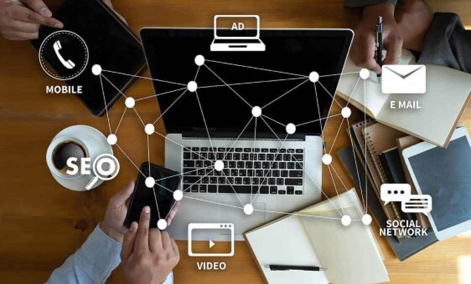 DIGITAL MARKETING new startup project MILLENNIALS Business team hands at work with financial reports and a laptop
